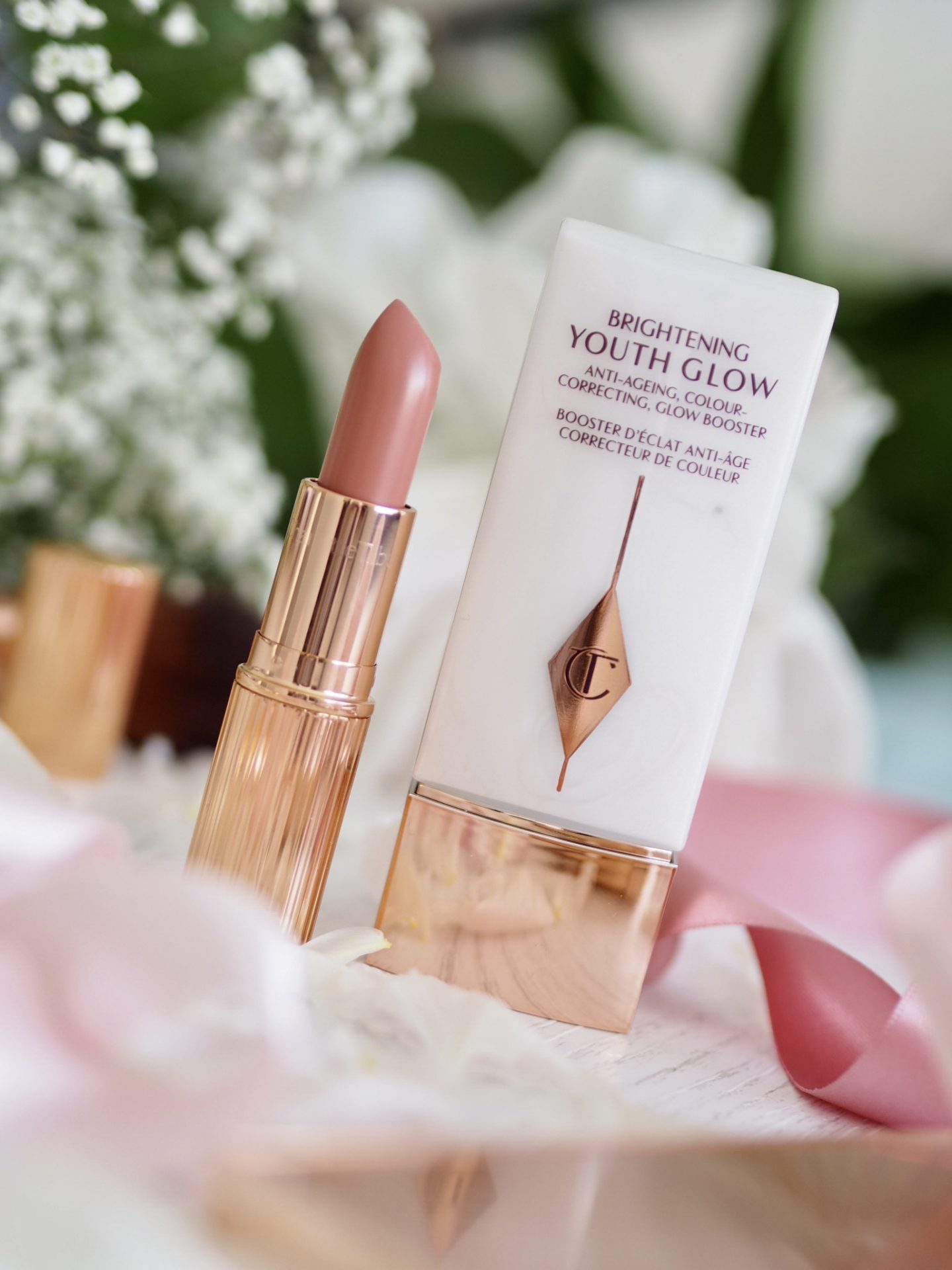 Two from Charlotte Tilbury Bitch Perfect Kissing lipstick brightening Youth Glow primer